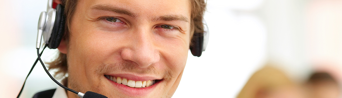 A friendly telephone operator in an office environment.
